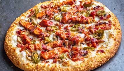 Enjoy this Smoky Mountain Pizzeria Grill pizza with chicken, bacon, jalapeños, and cheese.
